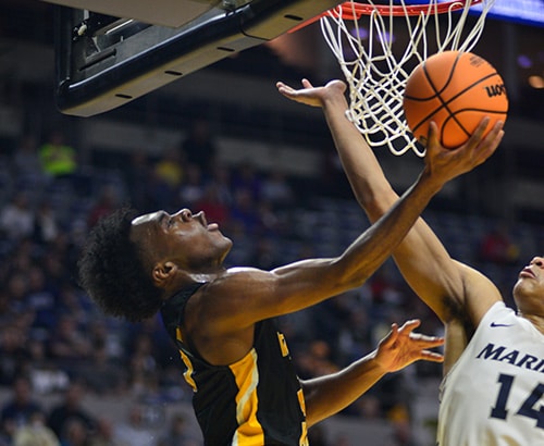 RMC athlete playing basketball