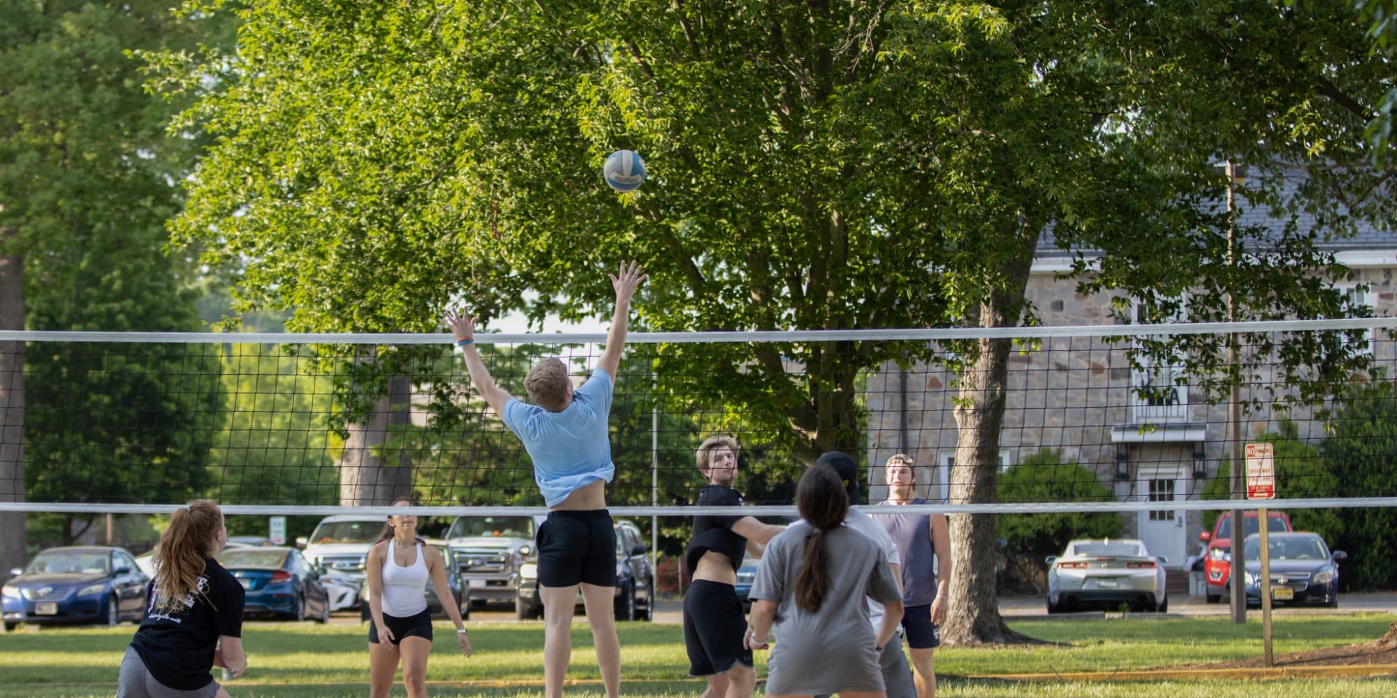 Students playing volleyball in Mary Branch Circle of Randolph-Macon College.