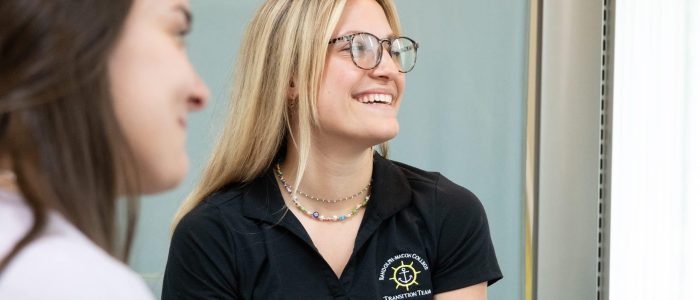 Female Student - Captain female student in chair