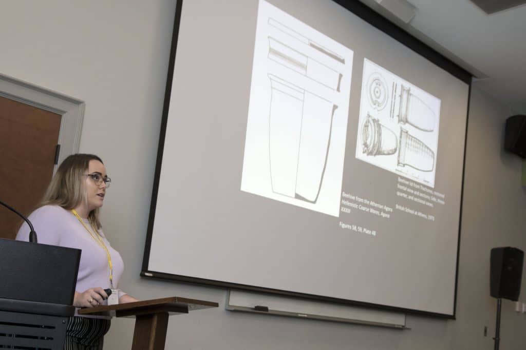 RMC Classics major presents to class using slides