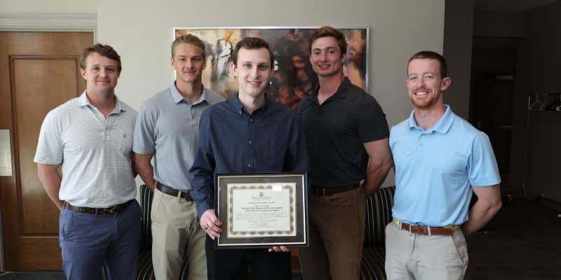 The 2022 Pepper and Stuart Laughon Commitment to Community Award winner with members of the Green Bandana Project