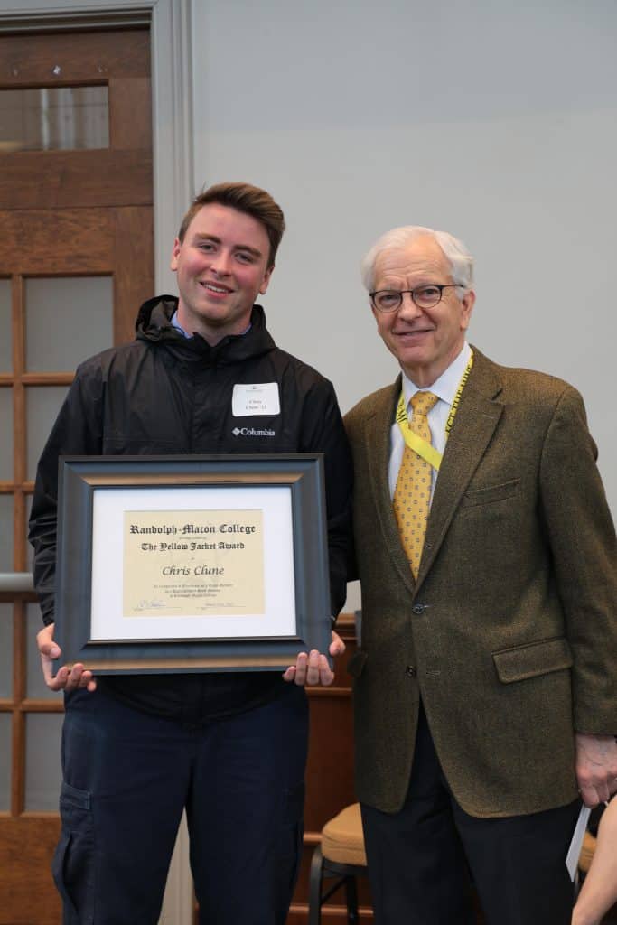 Chris Clune posing with President Lindgren