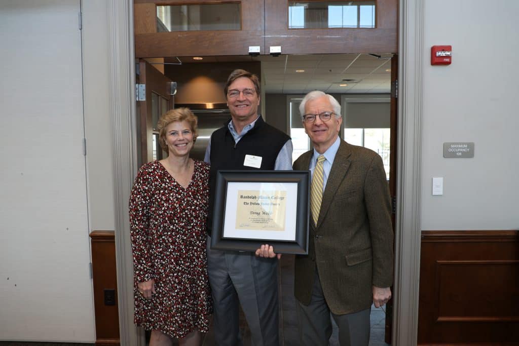 Doug Webb with President Lindgren holding his Yellow Jacket Award
