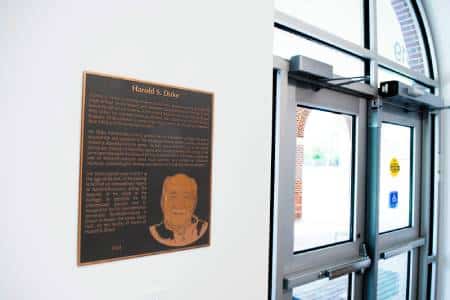 A plaque inside Duke Hall commemorating Harold Duke