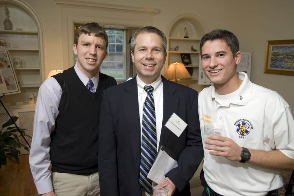 RMC Premed students with a doctor alum at a networking event