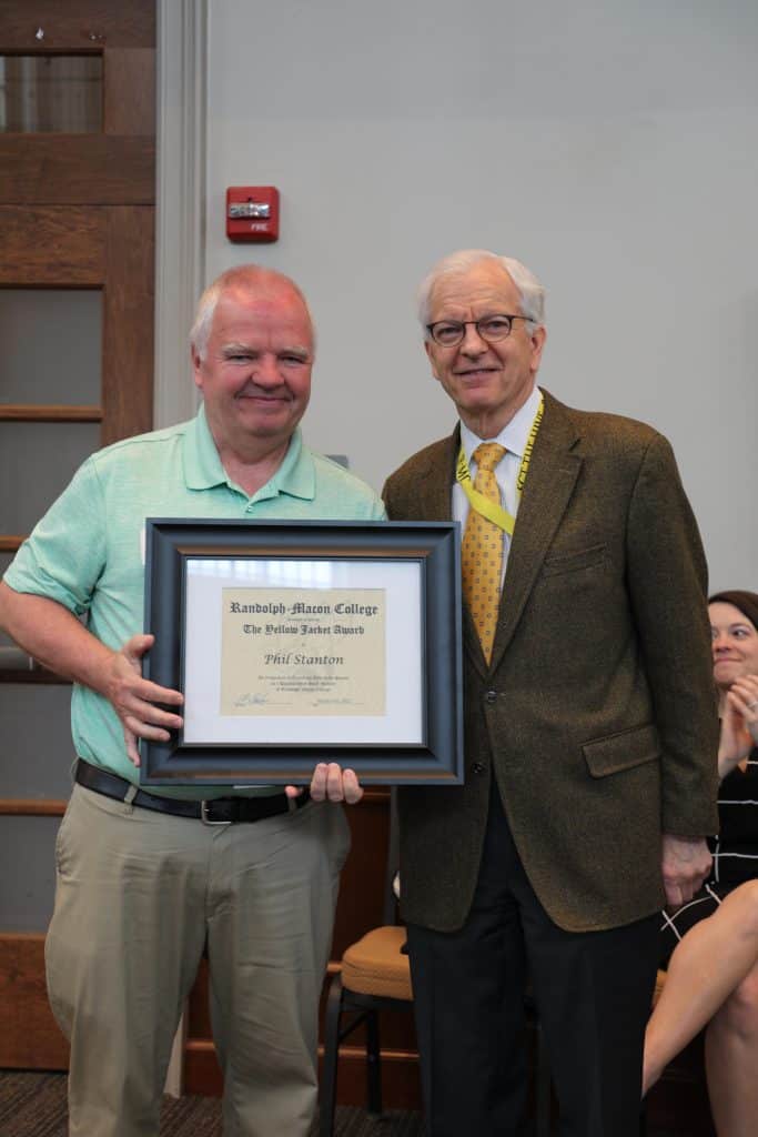 Phil Stanton posing with president Lindgren