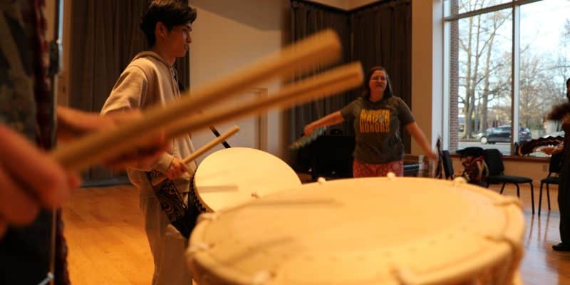 The RMC Japanese Festival Music Team practices the suzume odori, a traditional dance festival from the Miyagi Prefecture