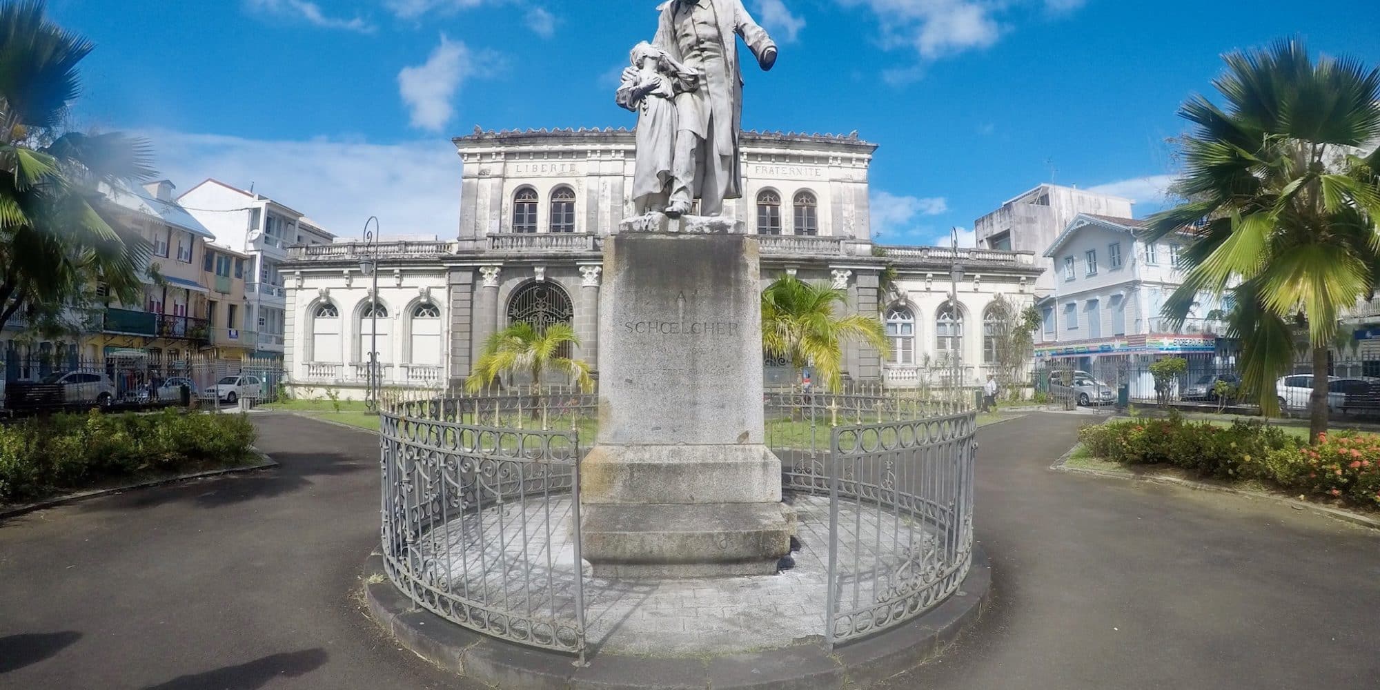 A car circle with sculpture at the center in France