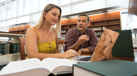 Waverly Gouldman '20 working with History Professor Mathias Bergmann in the library
