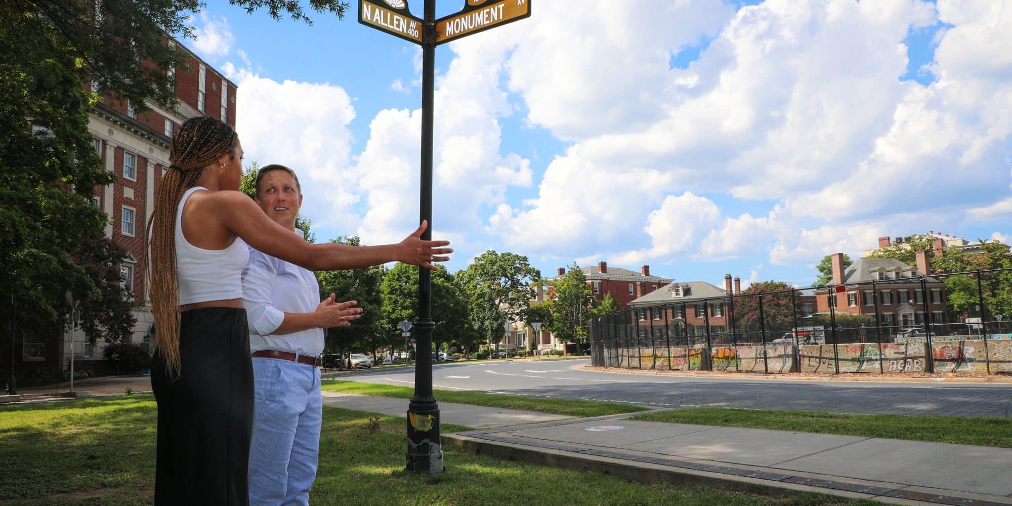 Randolph-Macon Student Tristen Craig and teacher Cr. Cribbs in Richmond, VA discussing the history of Monument Avenue