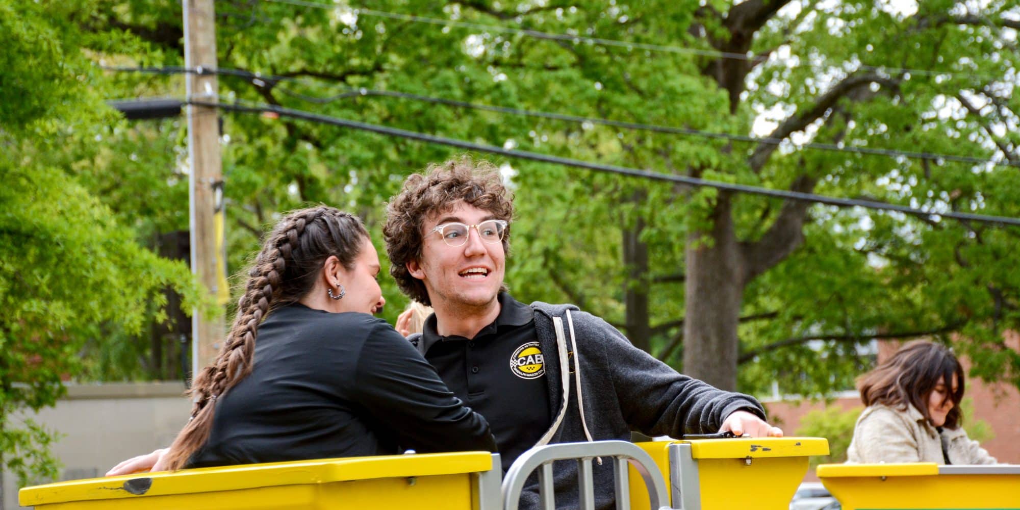 Randolph-Macon College students riding a carnival ride during the annual Camptown event.