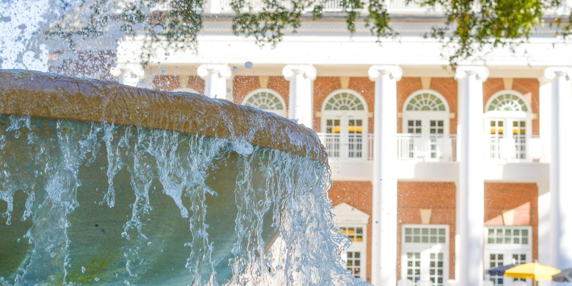 Tight shot of the Randolph-Macon College fountain with Brock center behind