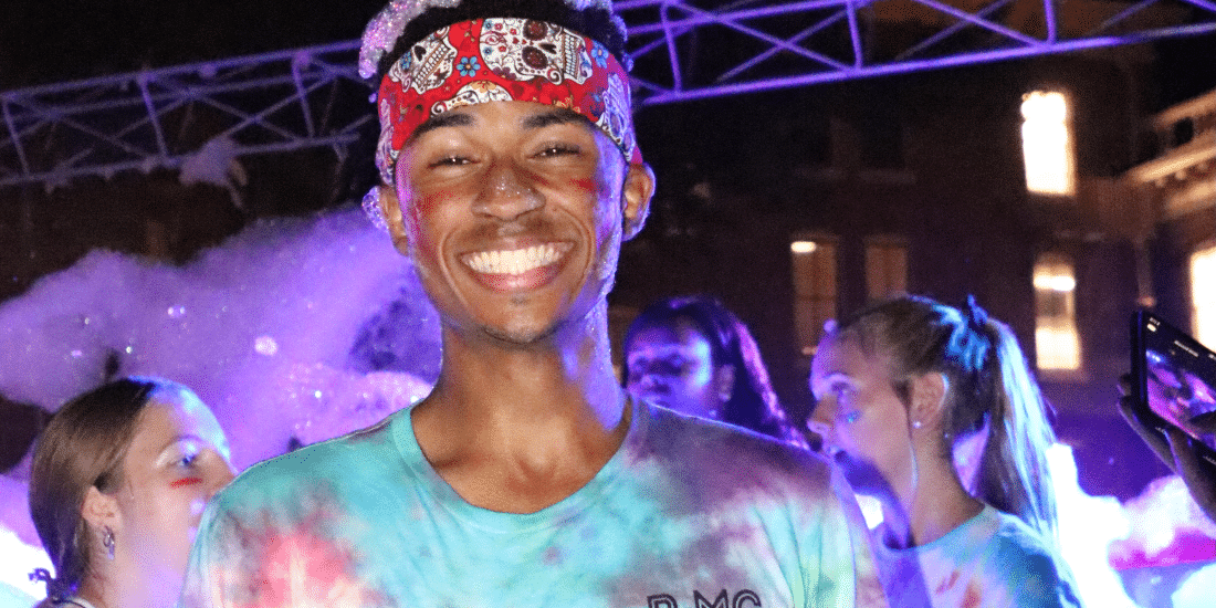 Male student covered in foam