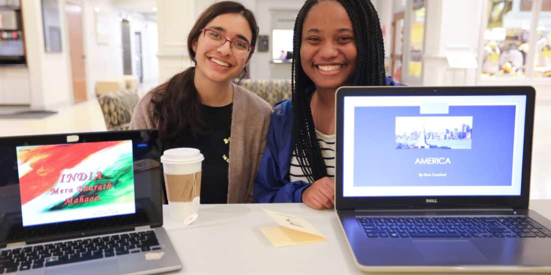 Students with presentations on laptops