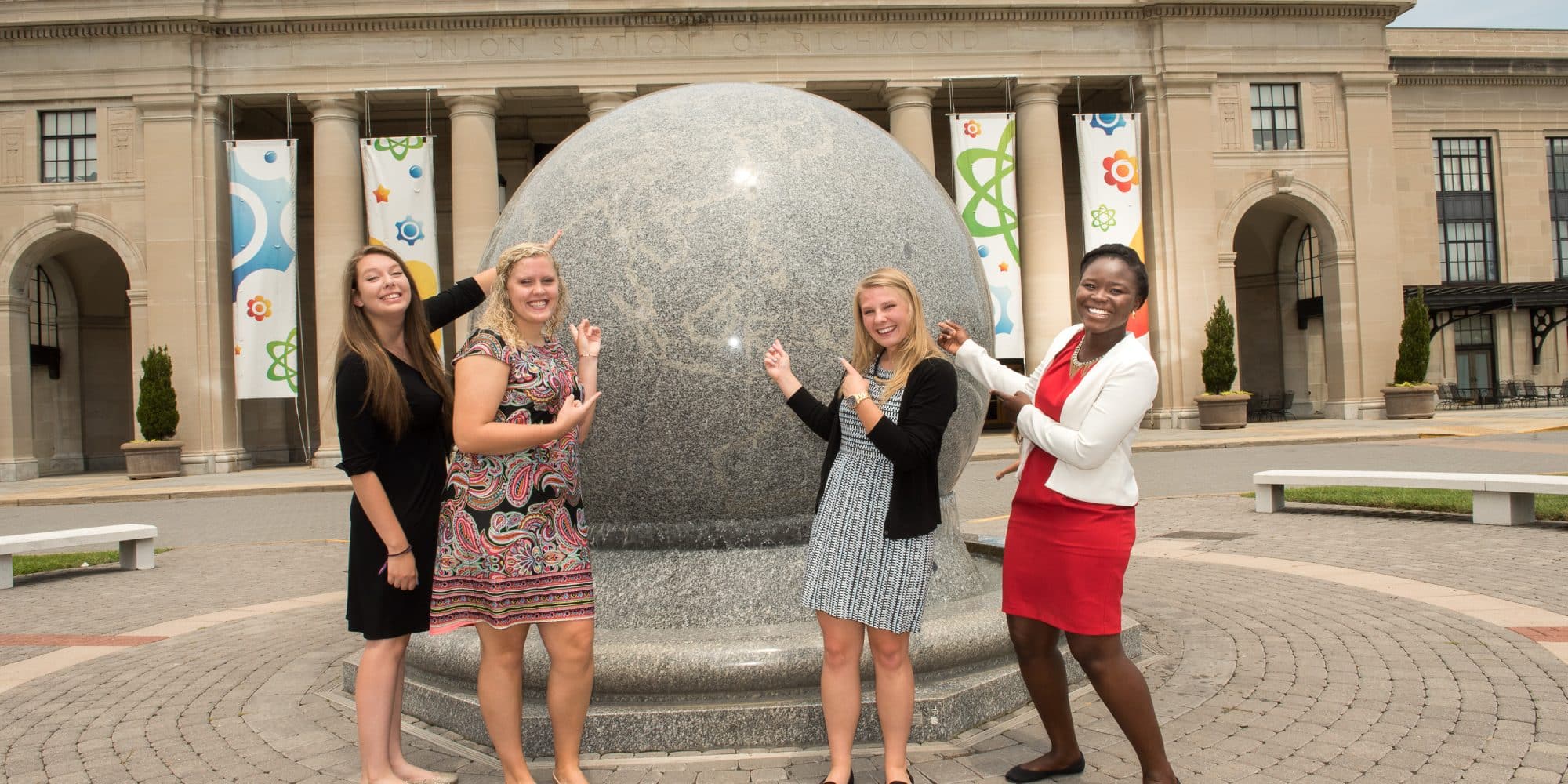 A group of RMC students pose for a photo during their internship with the Science Museum of Virginia