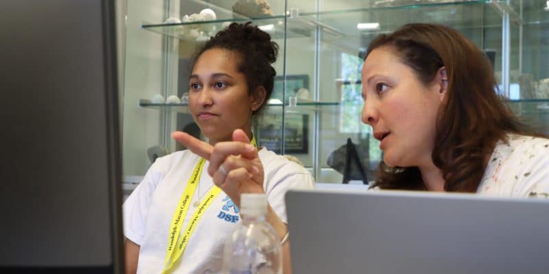 Professor Lauren Bell interacting with an RMC student