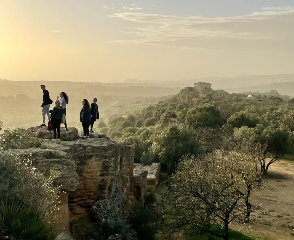 RMC students take in a picturesque sunset during a study abroad trip to Sicily