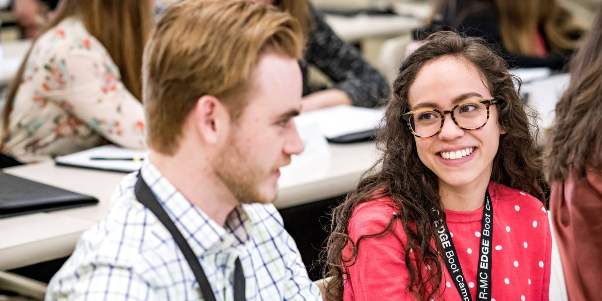 Two RMC students smile while participating in the Edge Boot Camp