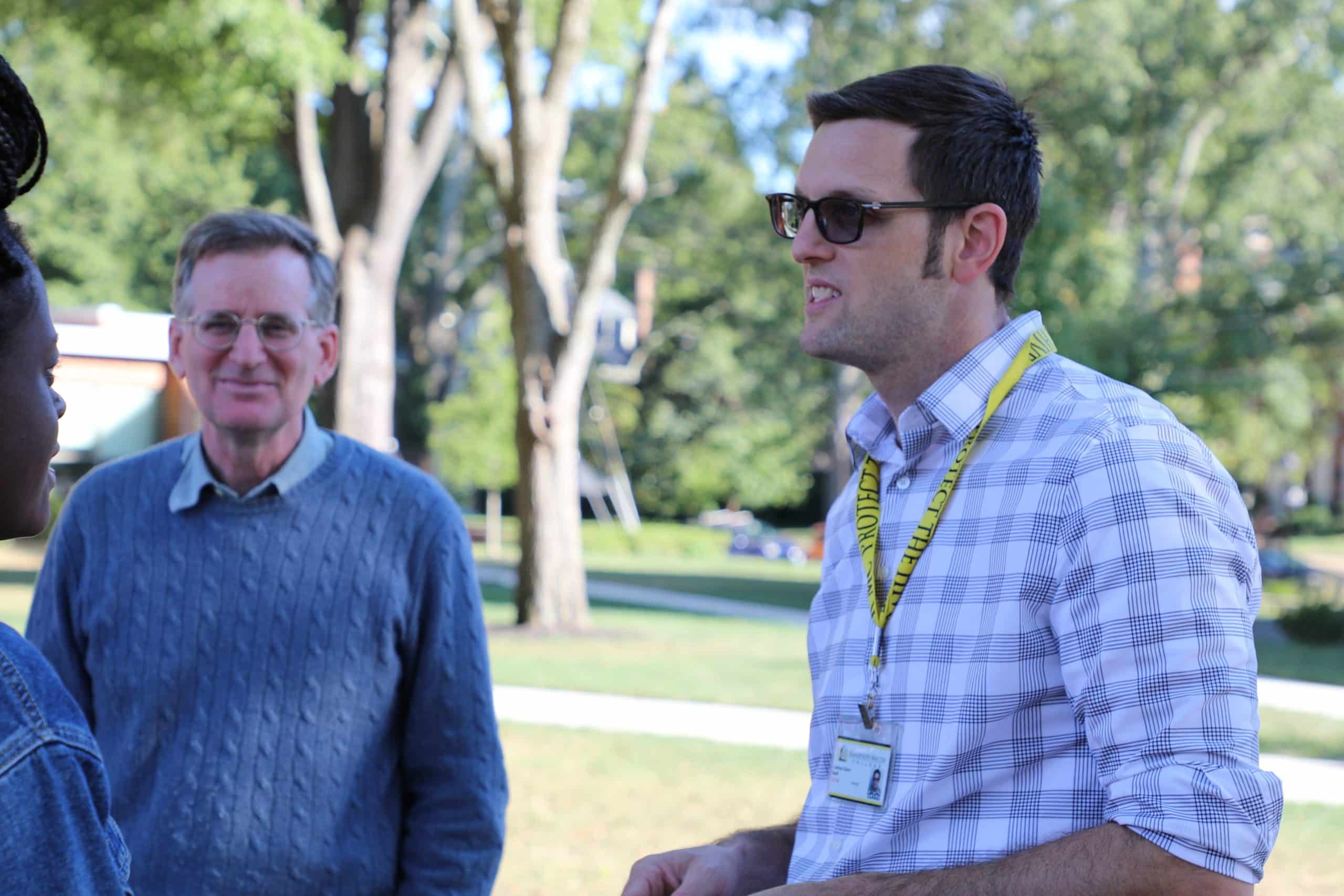 Josh Quinn, Director of Health Careers and Professional Development speaks with a student about health related career options