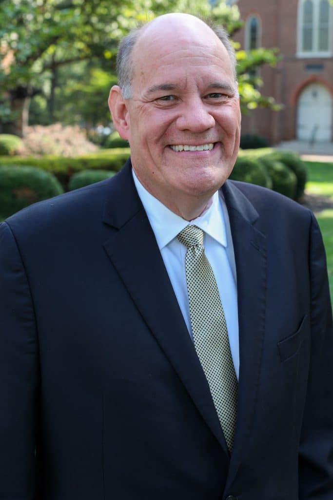 Grant Azdell in a suit and tie.