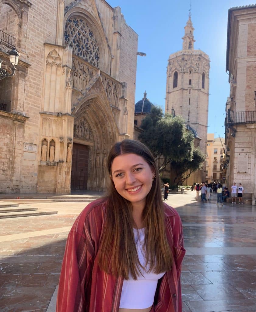Peyton Steele '24 in front of a cathedral during her semester abroad in Alicante, Spain