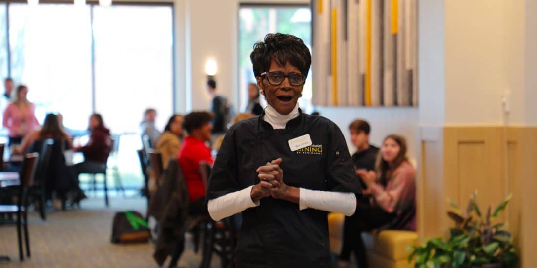Constance "Miss Connie" Holden wears a surprised expression in Estes Dining Hall