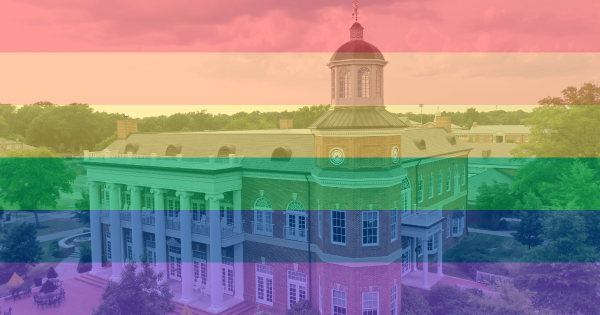 A historical building with columns and a dome is overlaid with a semi-transparent horizontal rainbow flag, symbolizing LGBTQ+ pride. Trees and other buildings can be seen in the background.