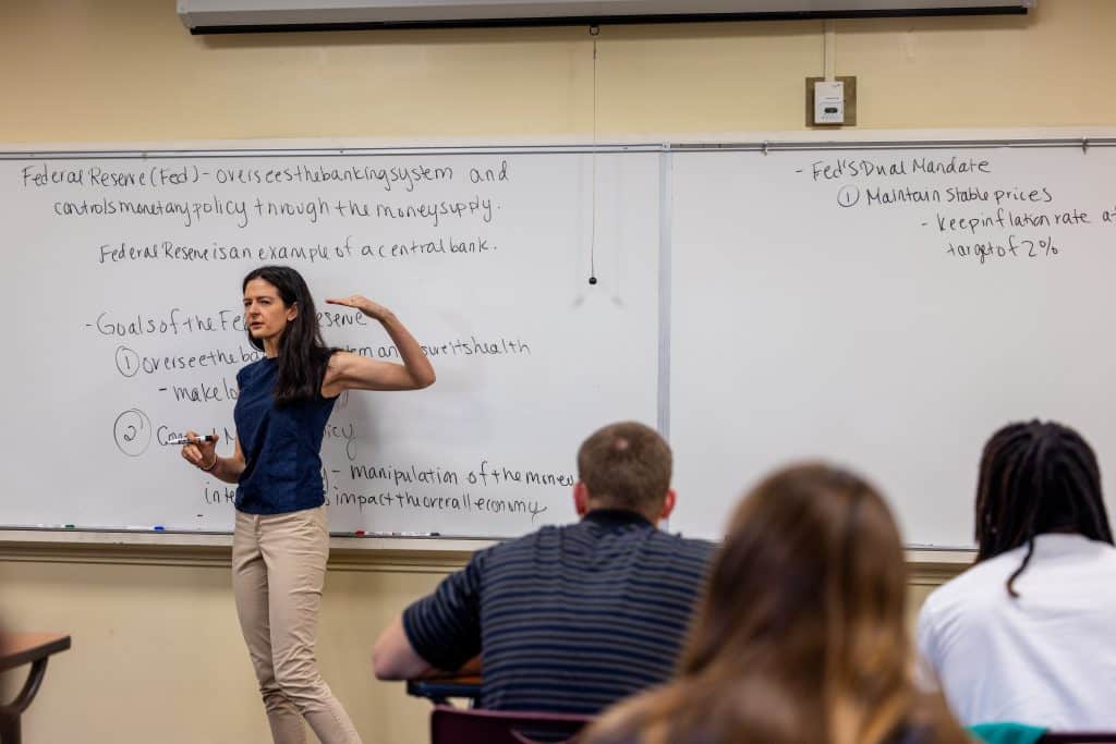 Photo of RMC Economics majors studying the Federal Reserve System