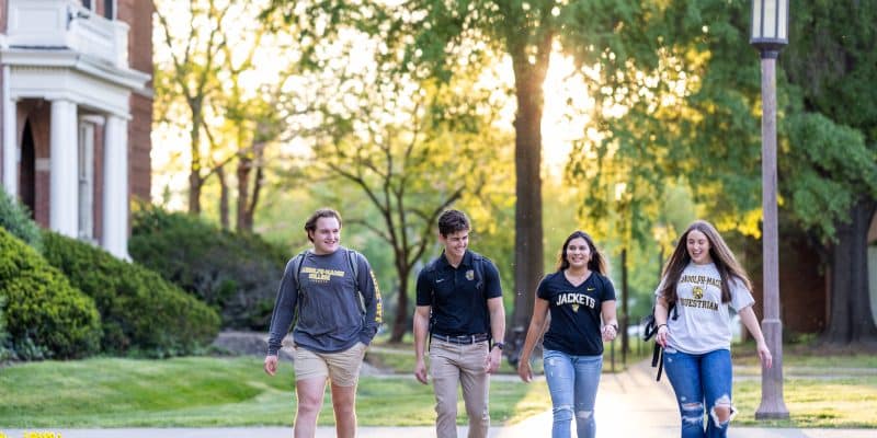 Current RMC students walking around on campus.