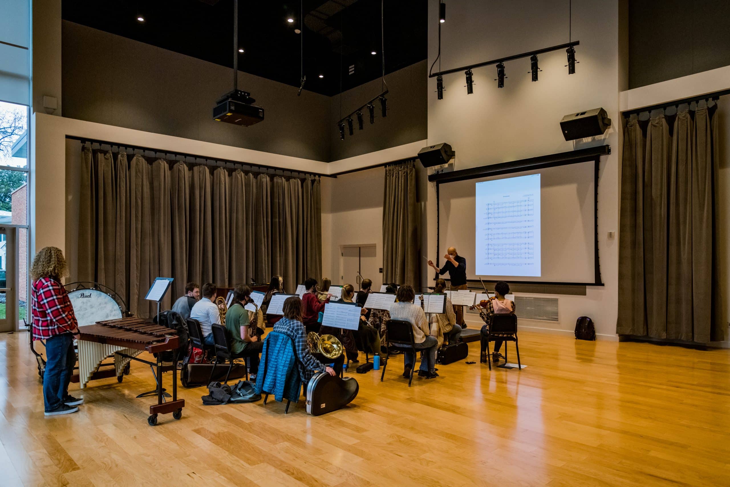 Students performing music in the Haun Rehearsal Hall.