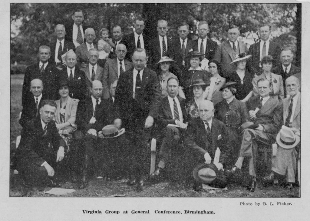 A formal group photo of men and women, dressed in early 20th-century attire, seated and standing, labeled as the Virginia Group at a General Conference in Birmingham.