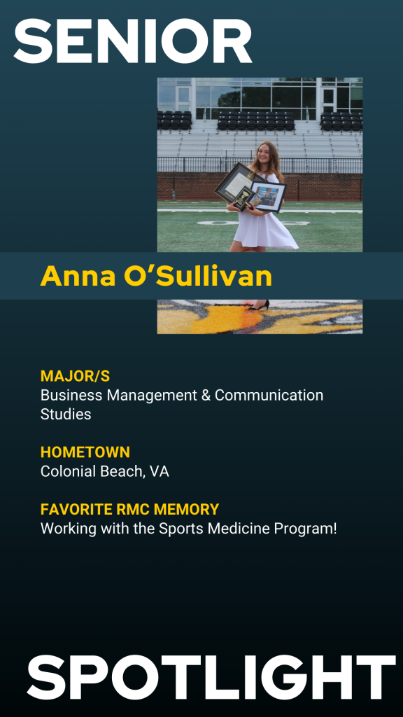 Anna O’Sullivan stands on a football field holding framed photos; majoring in Business Management & Communication Studies.