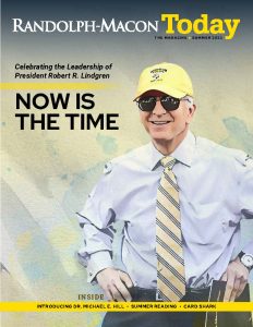 A person wearing a yellow baseball cap, sunglasses, and a white shirt with a yellow-striped tie stands smiling on the cover of RMC Magazine’s Summer 2025 issue.