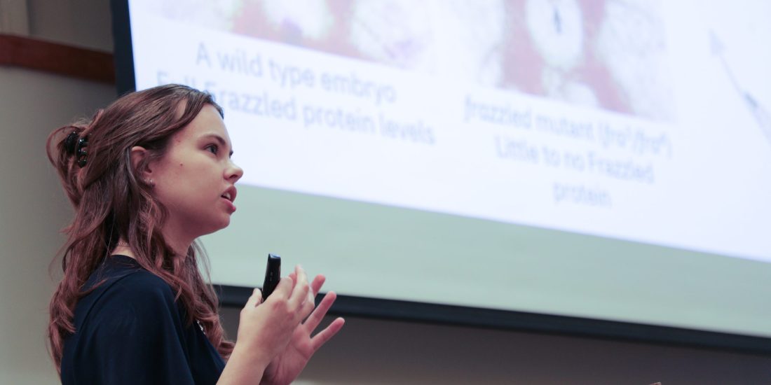 A student presents a PowerPoint during the 2026 SURF Symposium