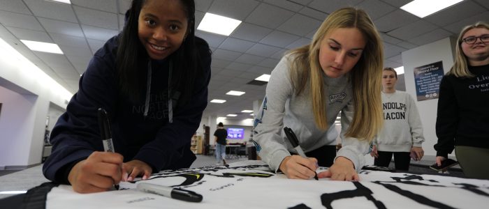 Class of 2027 Banner Signing in the Higgins Academic Center