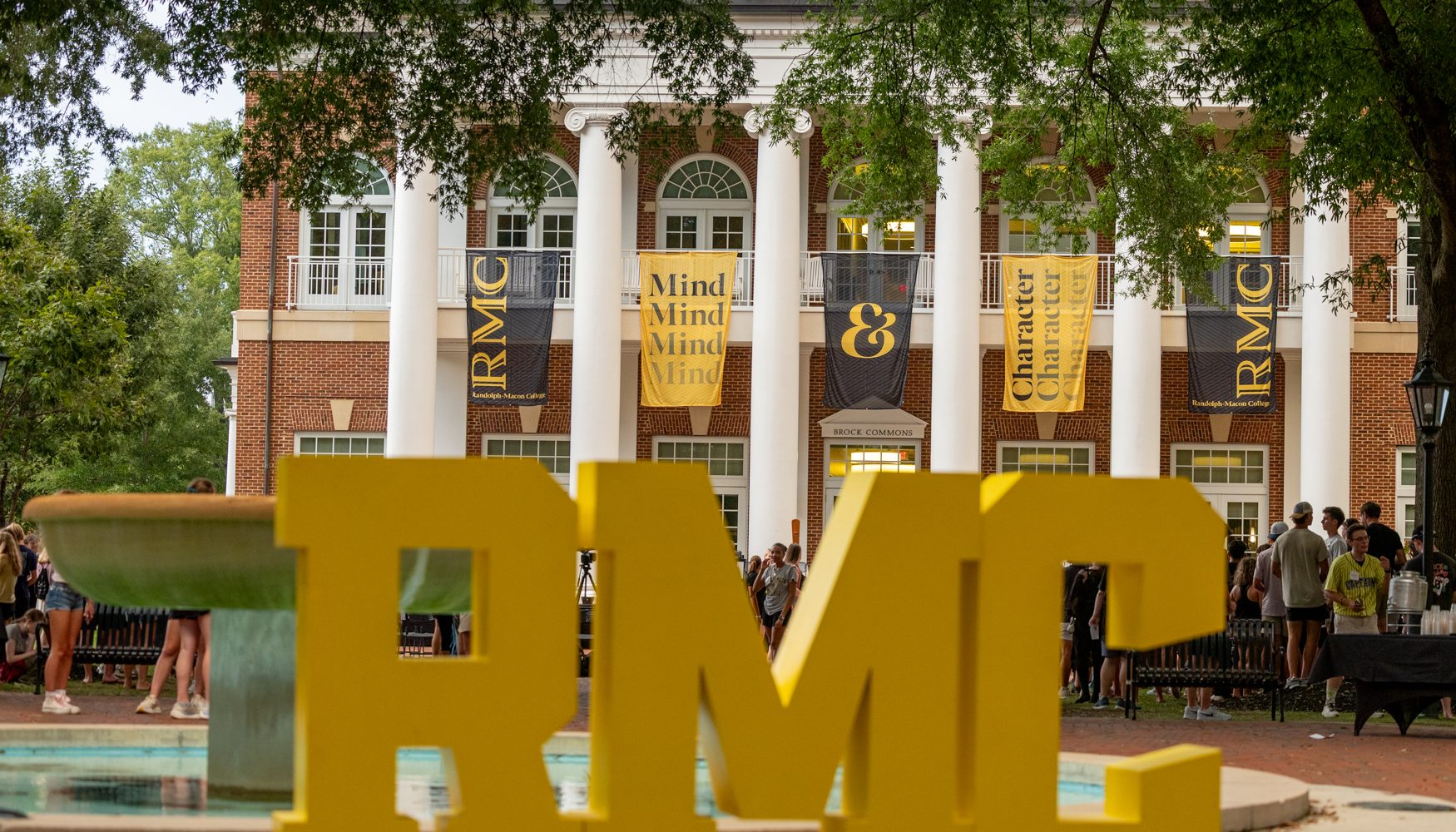 RMC letter signage with Brock commons behind