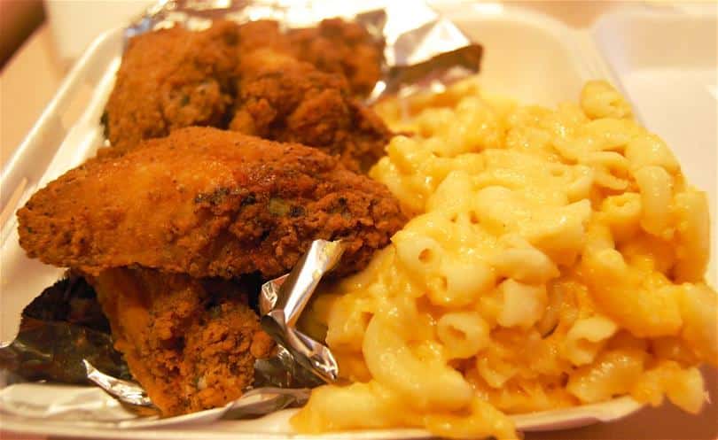 A stock image of fried chicken and mac-and-cheese