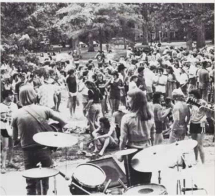 A picture of the Camptown festival, featuring a live band and a large crowd watching on