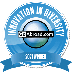 A blue award seal with the GoAbroad.com logo that reads, "Innovation in Diversity 2021 Winner"