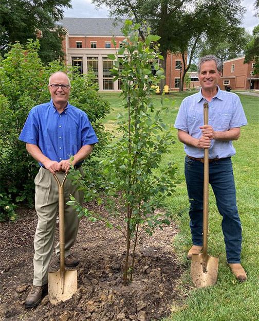 Profs. Gowan and Fenster at a tree planting